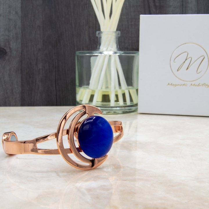 Womens Copper Bracelet with a Cresent moon and dark blue opal stone