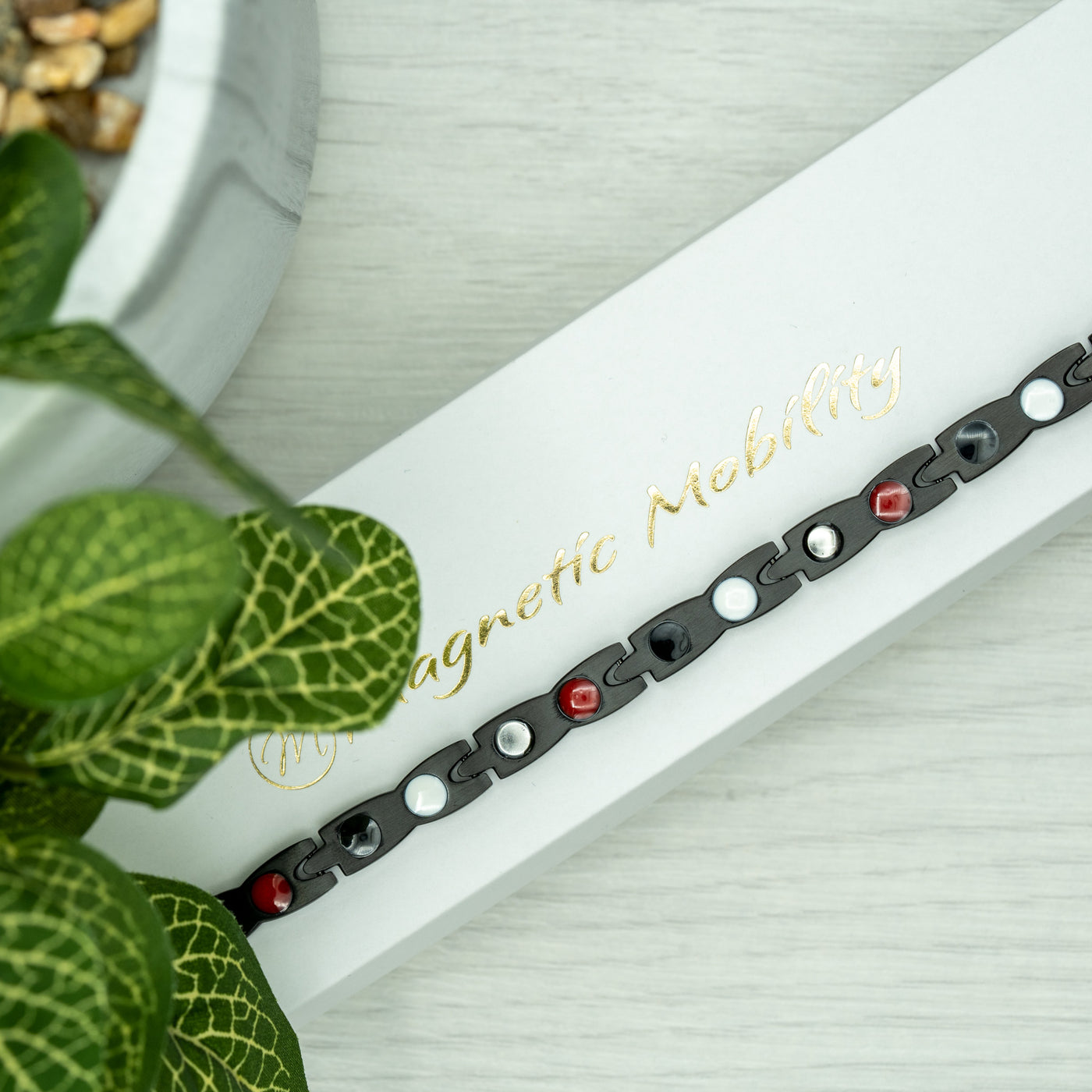 View of the back of Snapdragon Night 4in1 Magnetic Bracelet - shows the 4 elements on the back of the bracelet