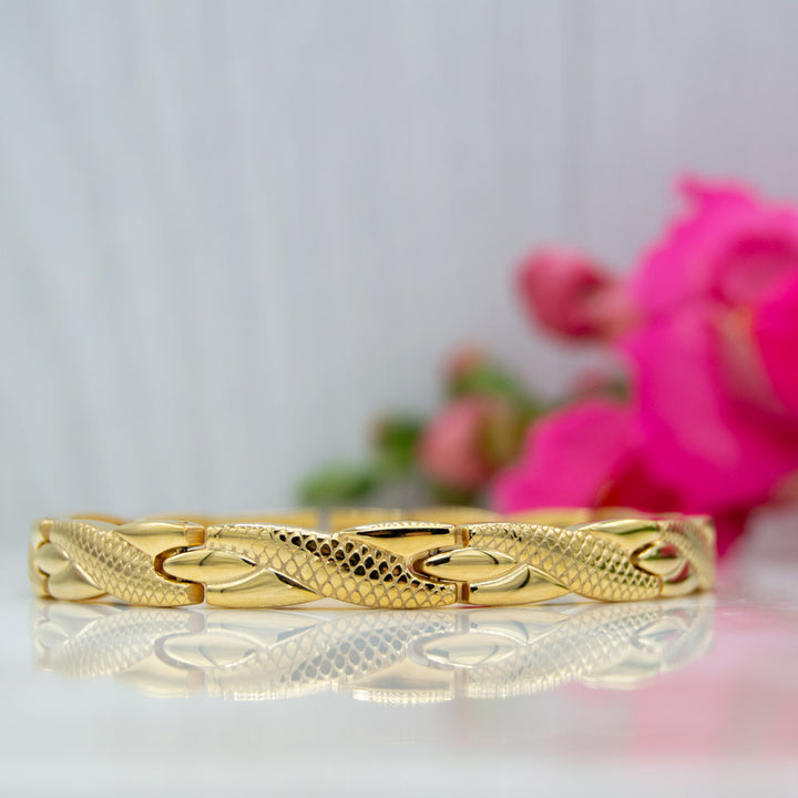Women's Gold colour 4in1 Health Elelement Magnetic Bracelet.  Front view. Snakeskin design. 