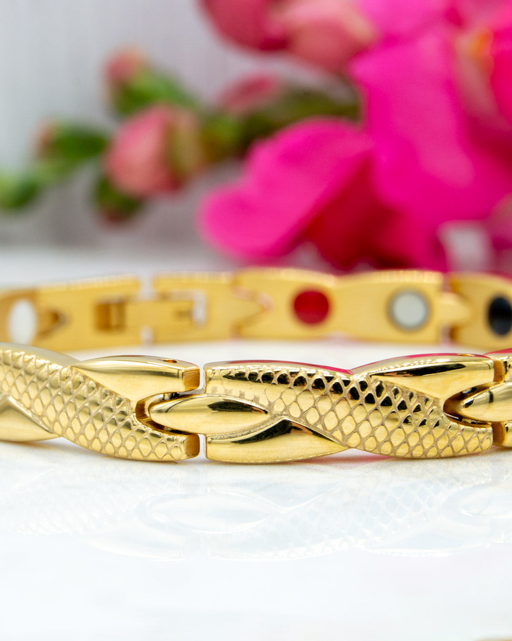 Women's Gold colour 4in1 Health Elelement Magnetic Bracelet.  Front view showing the elements in the back. Snakeskin design. 
